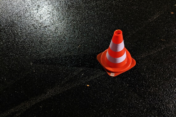 A picture of an orange traffic cone