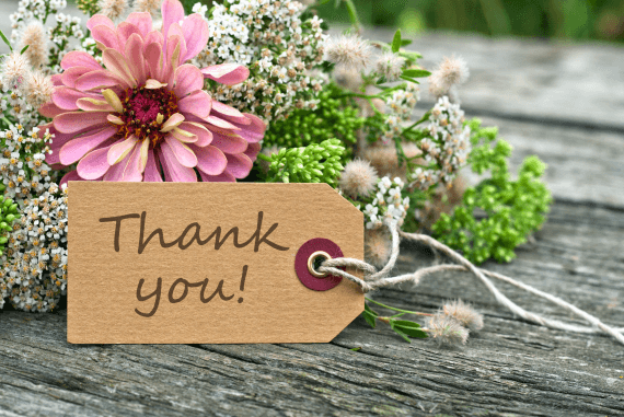 Flowers with a thank you tag label
